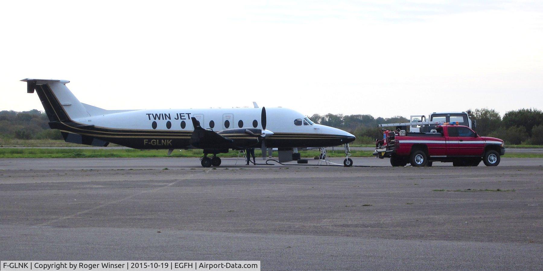 F-GLNK, 1997 Beech 1900D C/N UE-269, Visiting Beech 1900D operated by Twin Jet taking on fuel.