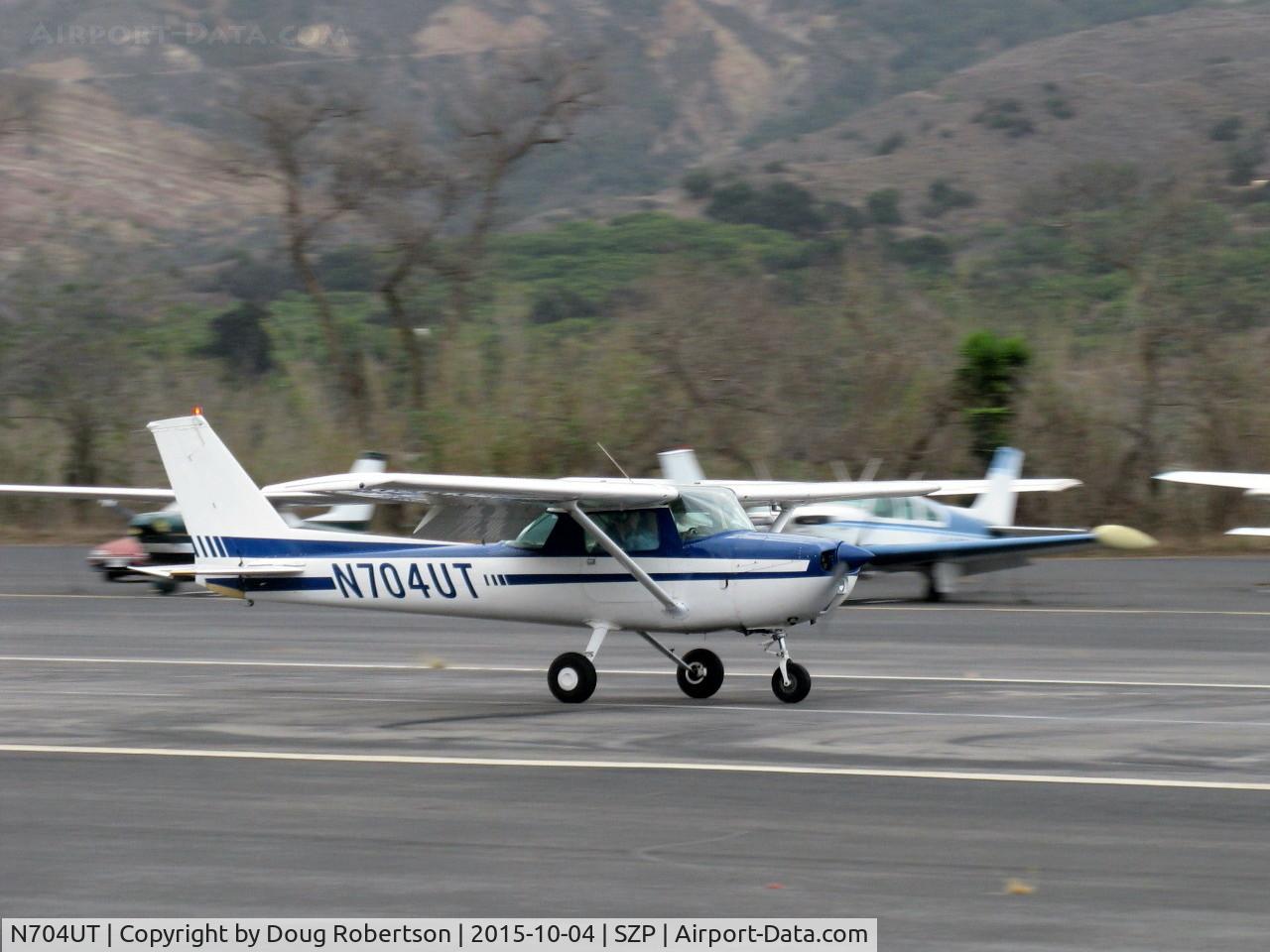 N704UT, 1976 Cessna 150M C/N 15078891, 1976 Cessna 150M, Continental O-200 100 Hp, landing roll Rwy 22 with full flaps down