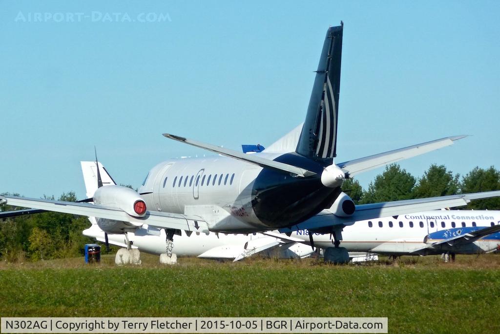 N302AG, 1996 Saab 340B+ C/N 340B-402, Stored in the SW corner of Bangor International Airport in Maine