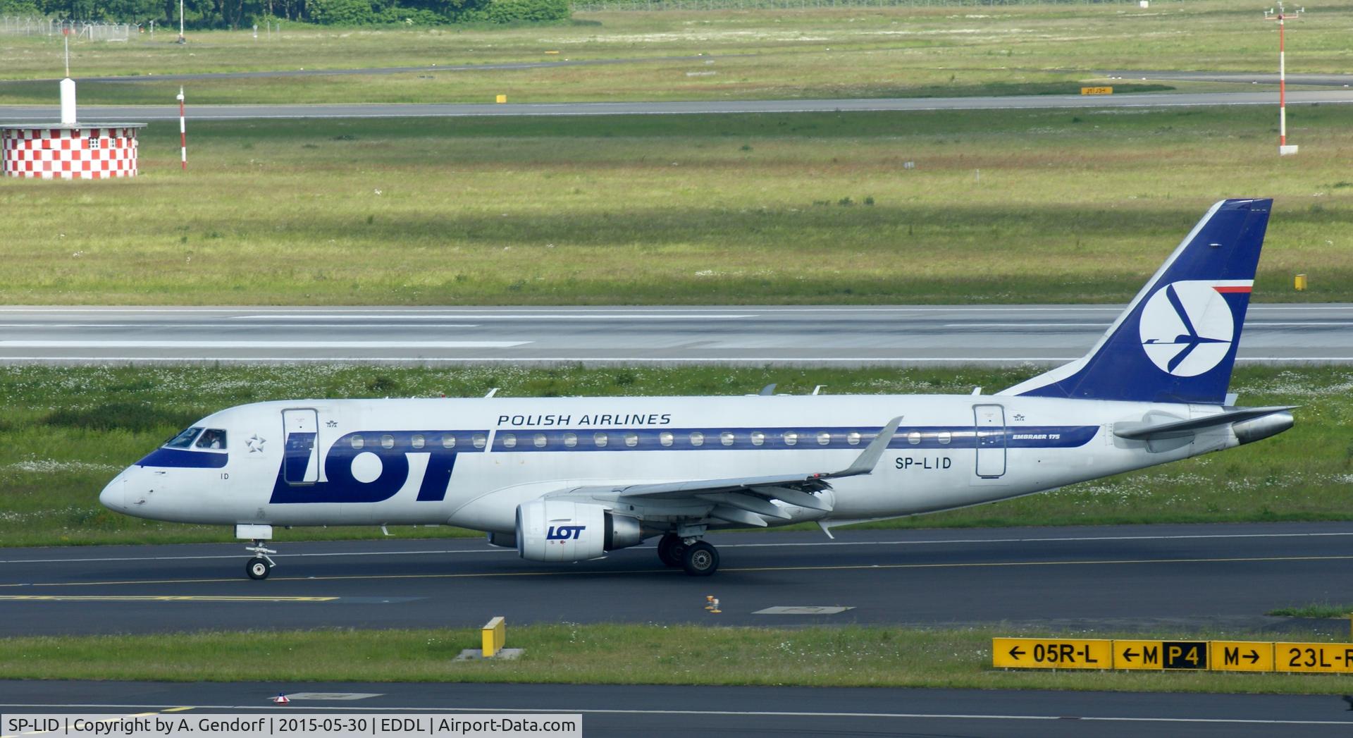 SP-LID, 2006 Embraer 175LR (ERJ-170-200LR) C/N 17000136, LOT, is here on taxiway 