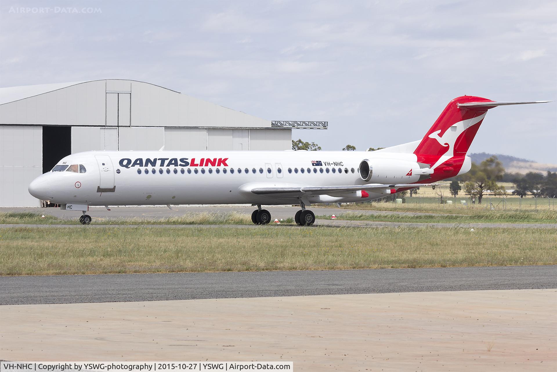VH-NHC, 1993 Fokker 100 (F-28-0100) C/N 11481, Network Aviation (VH-NHC), in newly painted QantasLink, taxiing at Wagga Wagga Airport.