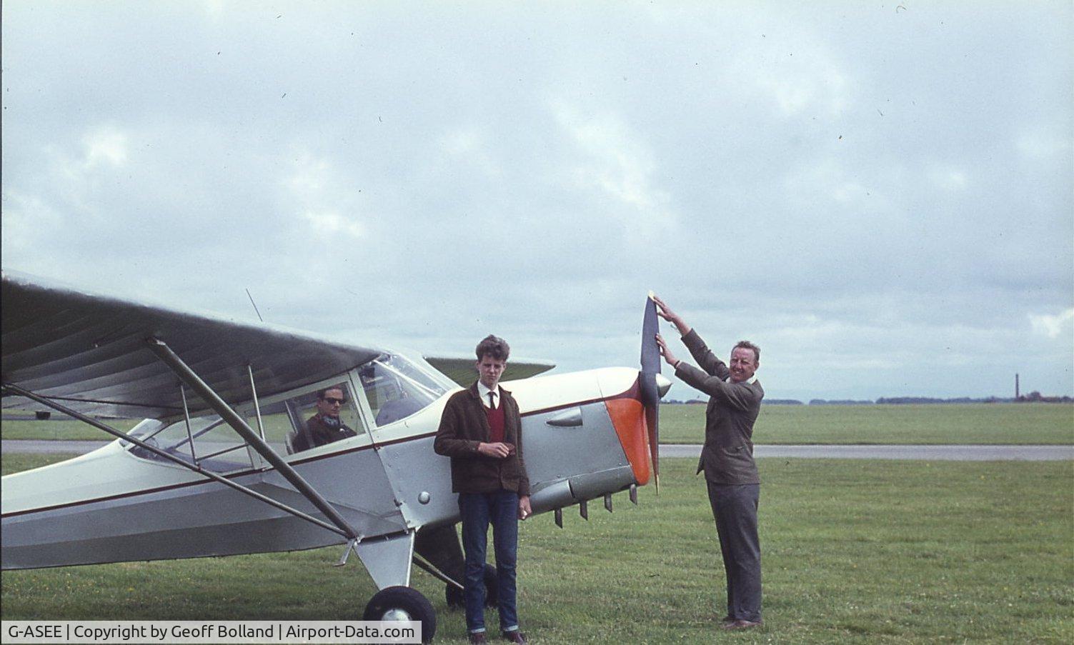 G-ASEE, 1956 Auster J-1N Alpha Alpha C/N 3359, My mother, Margaret Bolland, took this colour slide photo with my dads camera just before take-off. It's shows myself with Jim Bolland pretending to swing the prop.