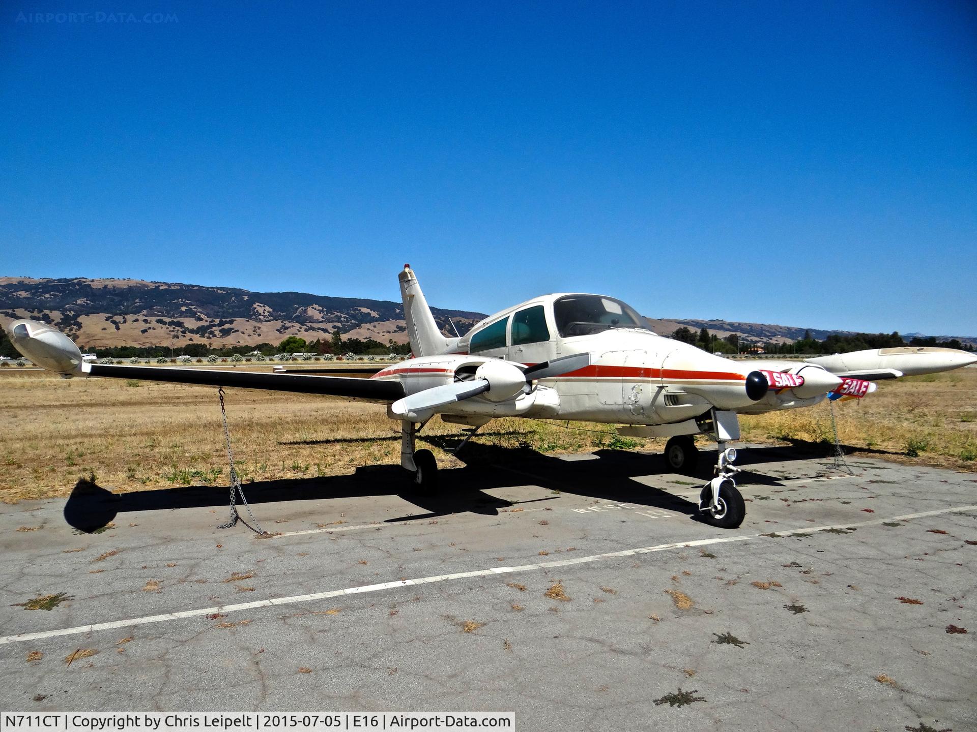 N711CT, 1973 Cessna 310Q C/N 310Q0677, Locally-based 1973 Cessna 310Q sitting at its tie down at South County Airport, San Martin, CA. It has been for sale for quite some time.