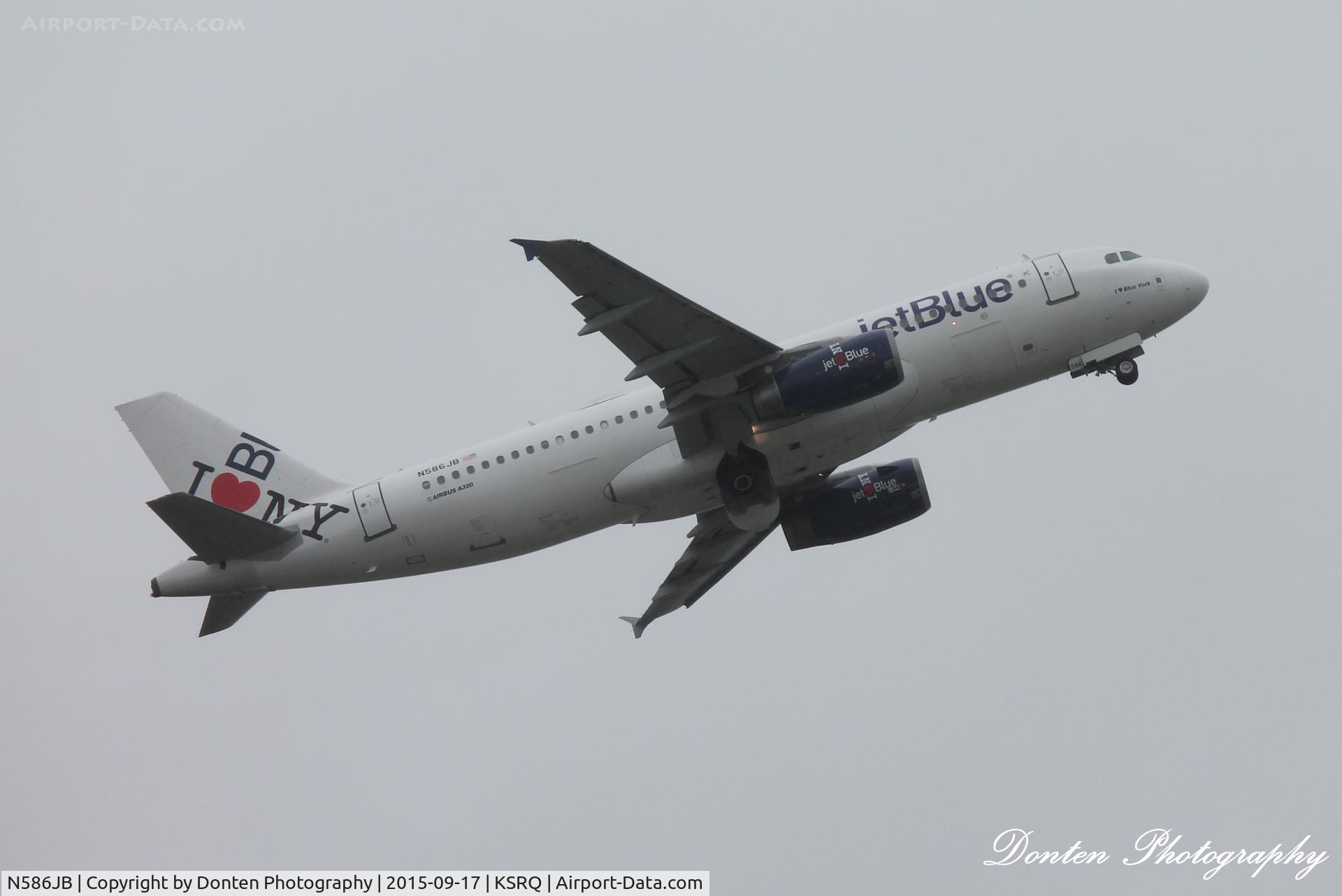 N586JB, 2004 Airbus A320-232 C/N 2160, JetBlue Flight 164 (N586JB) departs Sarasota-Bradenton International Airport enroute to John F Kennedy International Airport