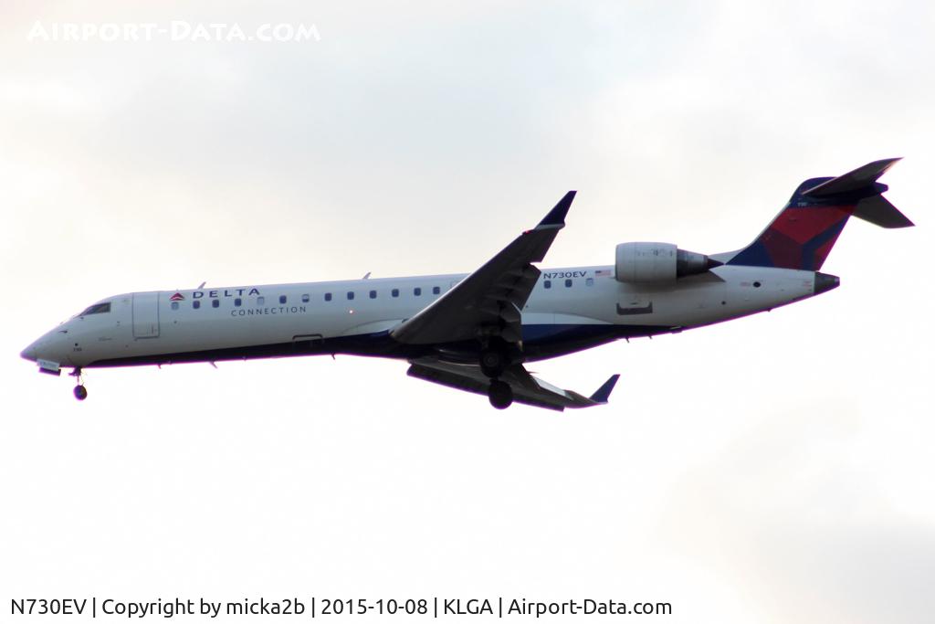 N730EV, 2004 Bombardier CRJ-701 (CL-600-2C10) Regional Jet C/N 10141, Landing