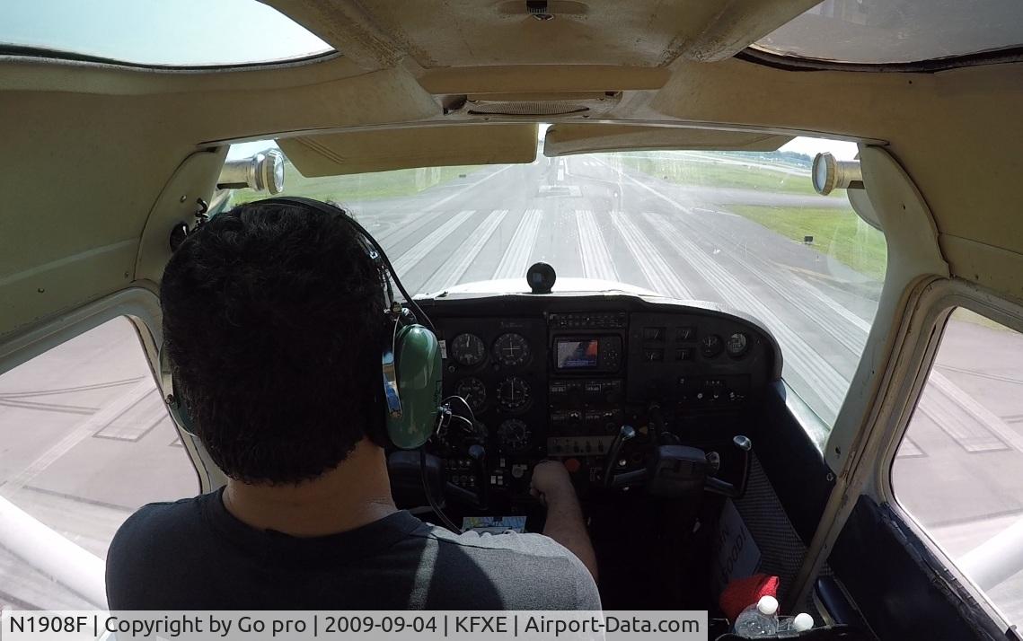 N1908F, 1973 Cessna 172M C/N 17256493, Landing runway 9 @ kfxe