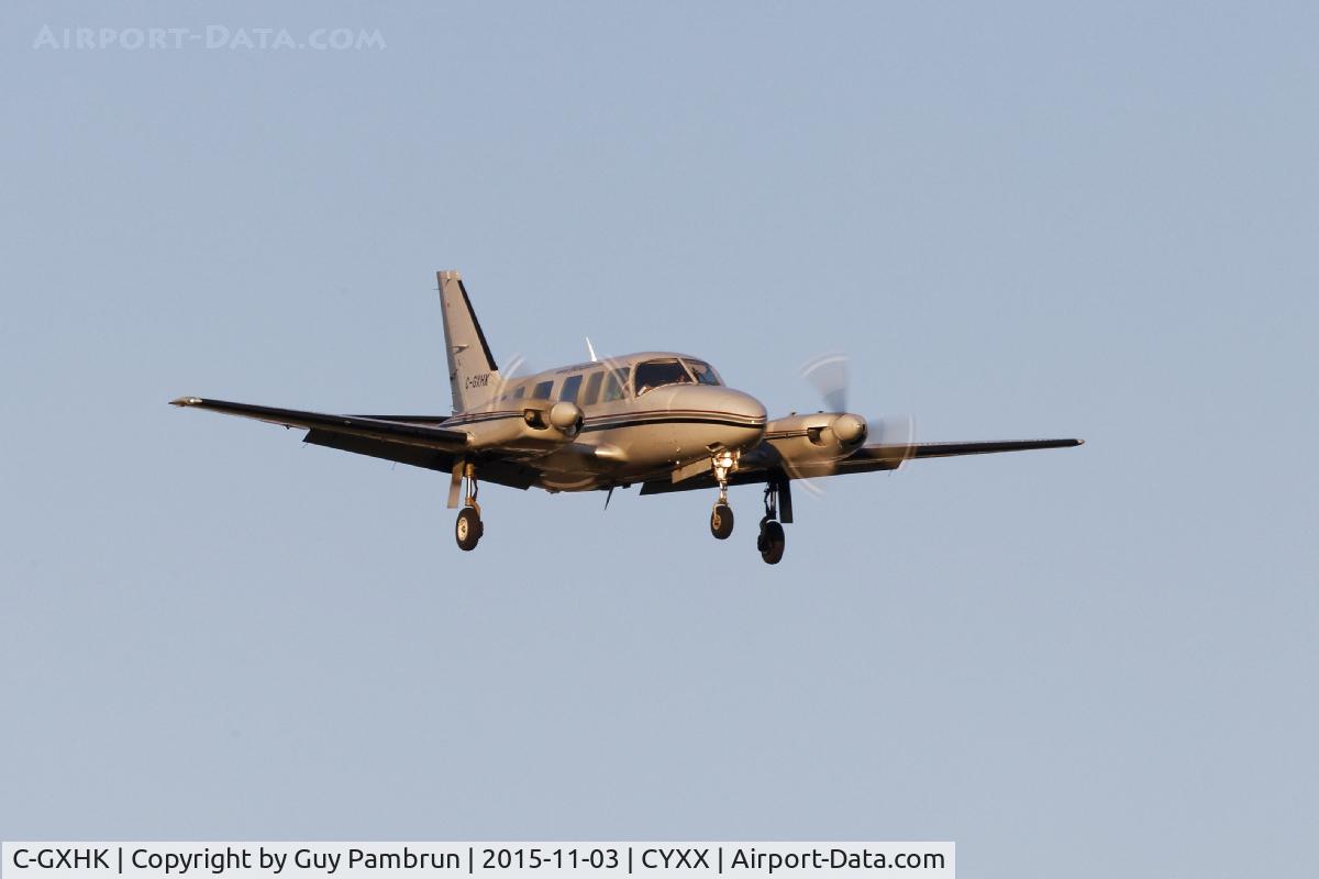 C-GXHK, 1977 Piper PA-31-350 Chieftain C/N 31-7752108, Landing at sunset