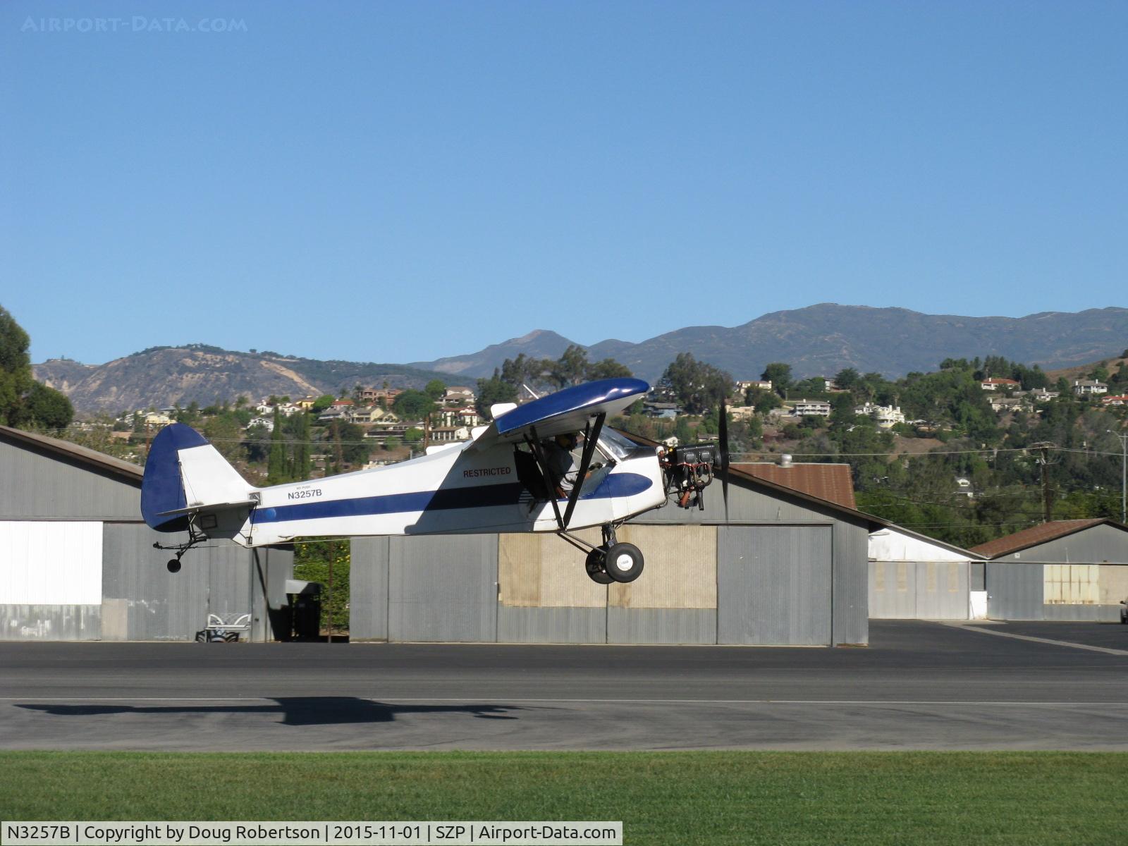 N3257B, 1954 Piper PA-18-135 Super Cub C/N 18-3275, 1954 Piper PA-18-135 SUPER CUB, Lycoming O-320 upgrade, larger wings, aileron fences, droop tips, Restricted class aerial advertising, takeoff climb Rwy 04-will tow banner today