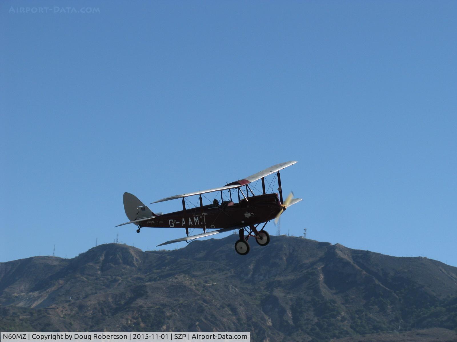 N60MZ, 1930 De Havilland DH-60G Gypsy Moth C/N 1293, 1930 DeHavilland DH.60G GIPSY MOTH, DeHavilland GIPSY II 4 cylinder inverted in-line air-cooled 120 Hp, takeoff climb Rwy 22 after wind shift. NOTE: GIPSY is the correct spelling, not Gypsy.