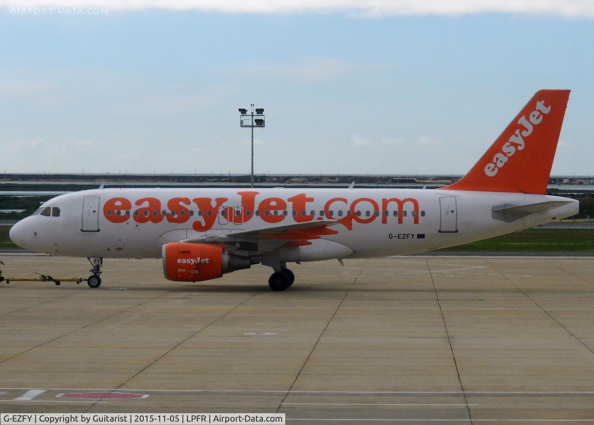 G-EZFY, 2010 Airbus A319-111 C/N 4418, At Faro