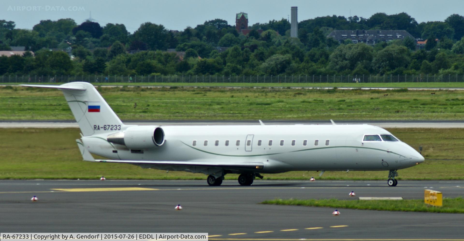 RA-67233, 2009 Bombardier Challenger 850 (CL-600-2B19) C/N 8105, Tulpar Air (untitled), is here taxiing to RWY 23L at Düsseldorf Int'l(EDDL)
