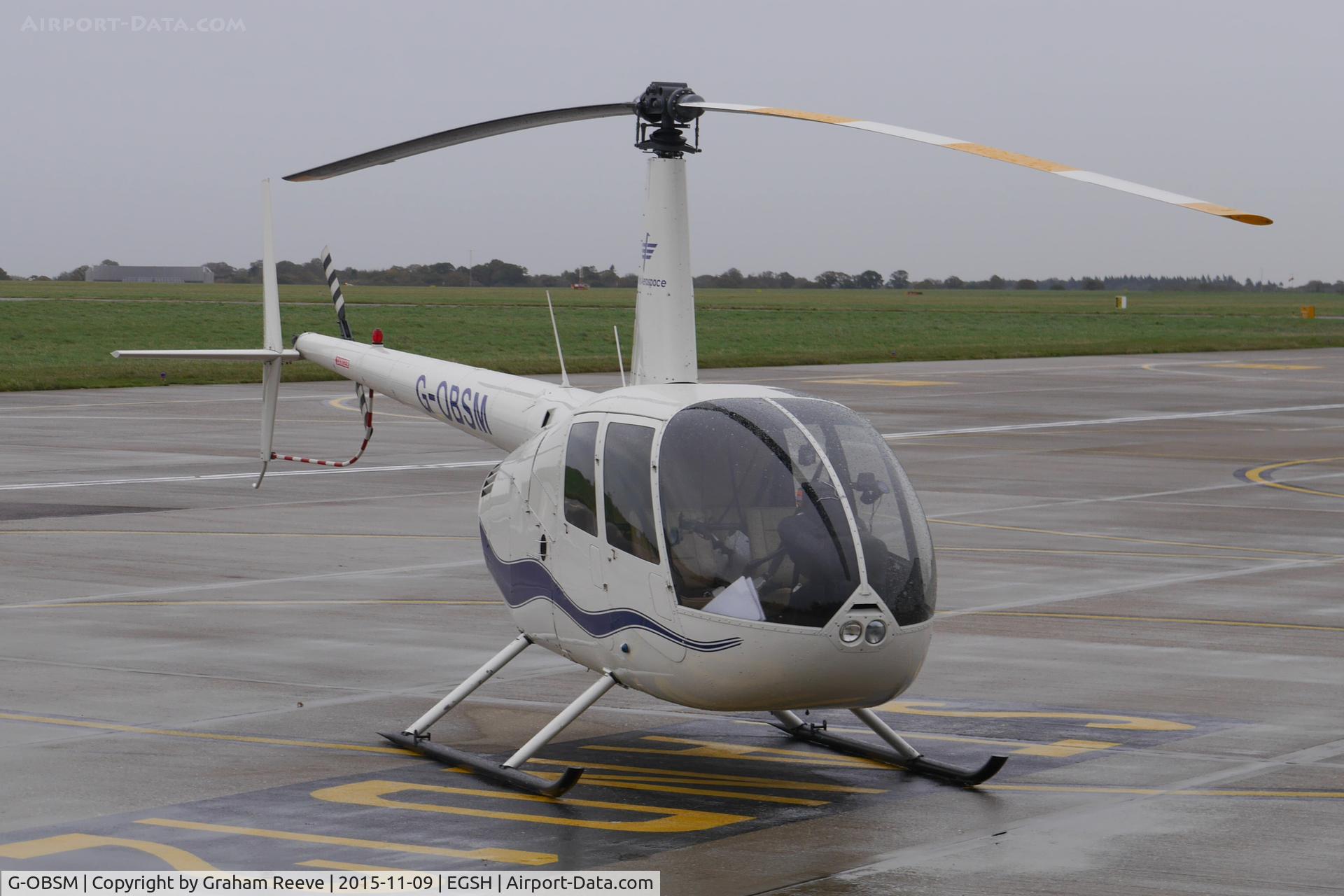 G-OBSM, 2001 Robinson R44 Raven C/N 1030, Parked at Norwich.