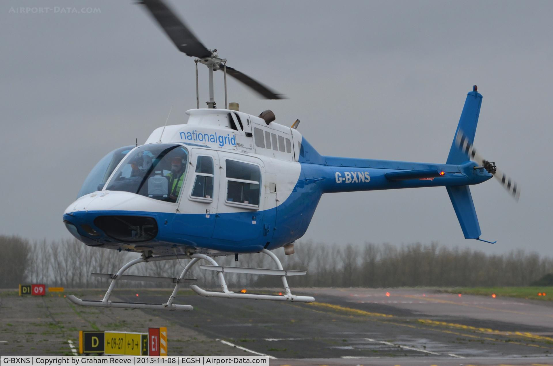 G-BXNS, 1977 Bell 206B JetRanger III C/N 2385, Landing at Norwich.