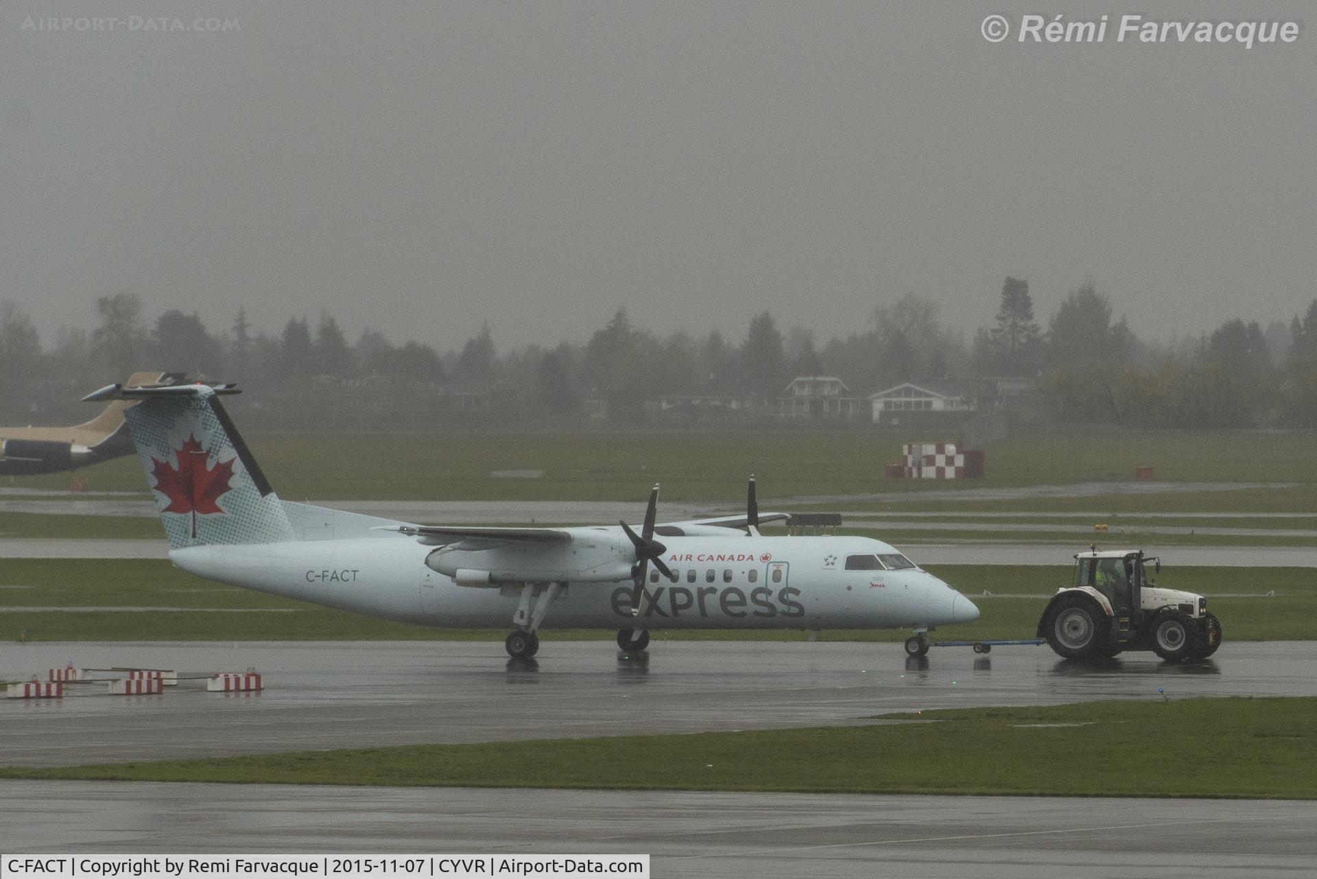 C-FACT, 1991 De Havilland Canada DHC-8-311 Dash 8 C/N 262, Being towed to departures, C wing.