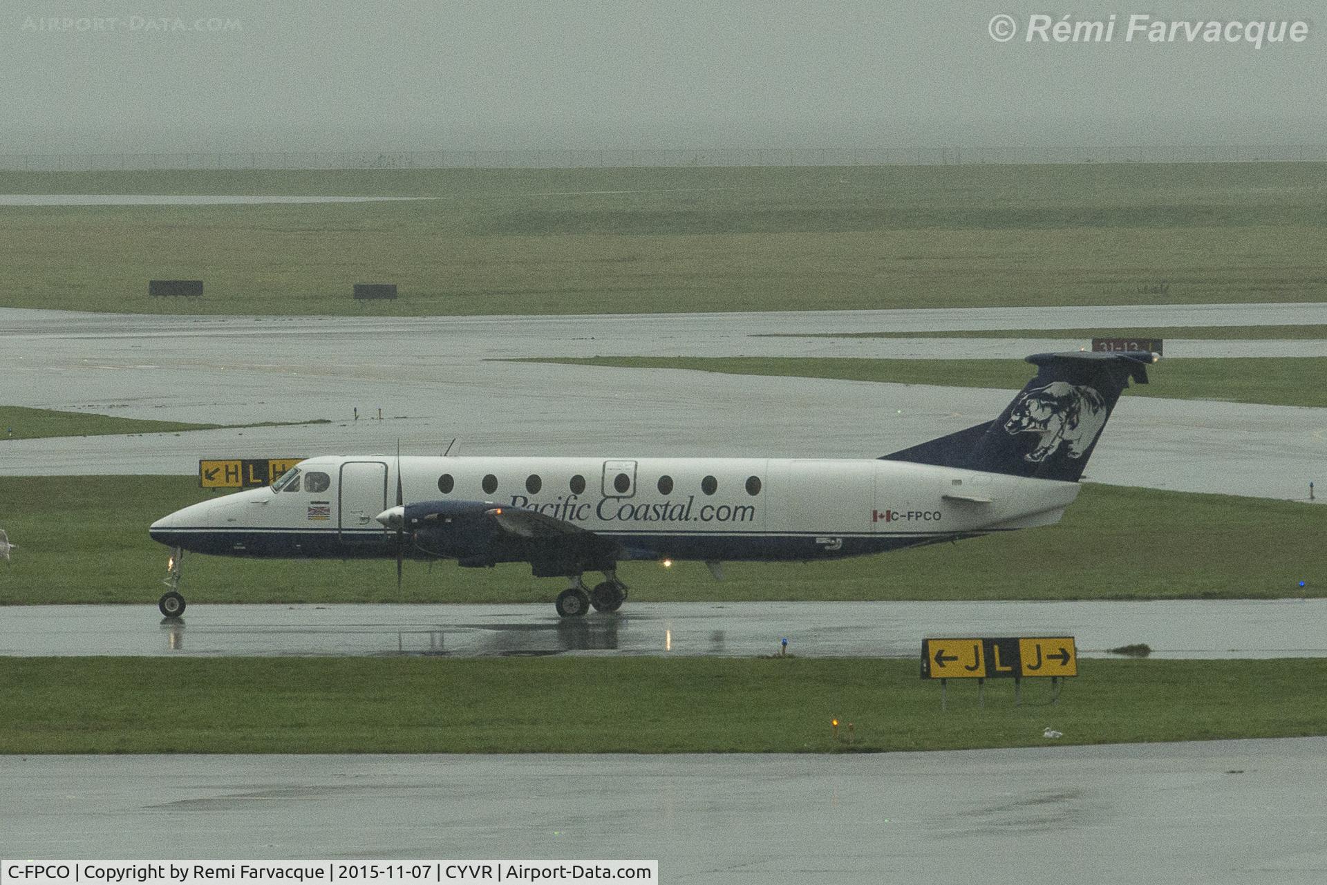 C-FPCO, 1986 Beech 1900C C/N UB-52, Just landed, taxiing to B-wing.
