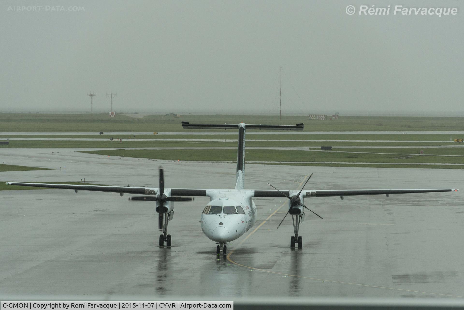 C-GMON, 1989 De Havilland Canada DHC-8-301 Dash 8 C/N 131, Arriving to gate, C-wing.