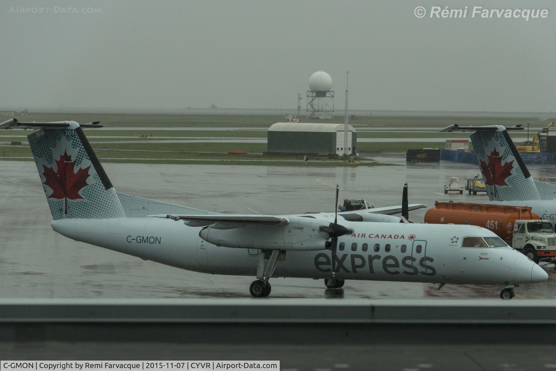 C-GMON, 1989 De Havilland Canada DHC-8-301 Dash 8 C/N 131, Arriving to gate, C-wing.