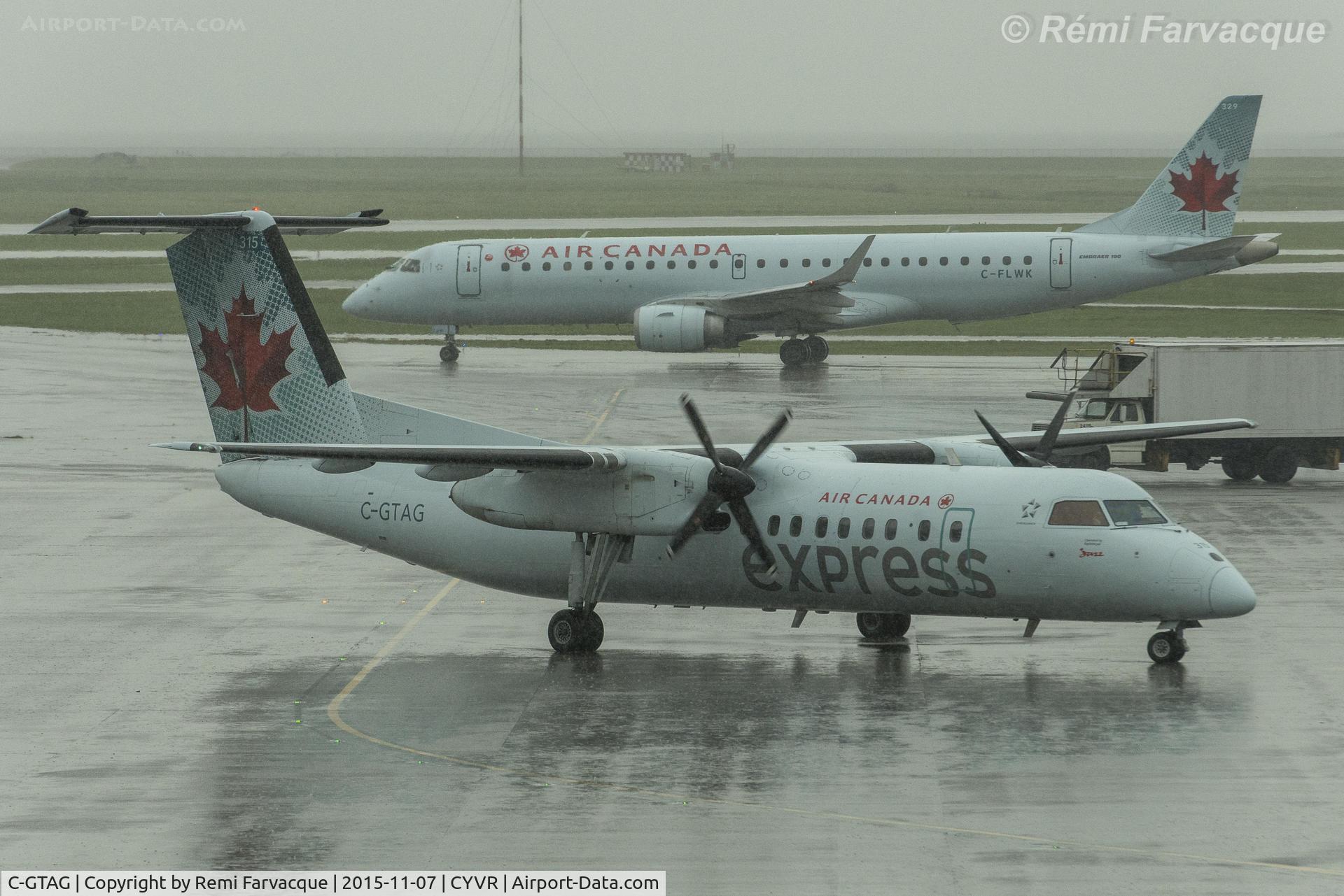 C-GTAG, 1990 De Havilland Canada DHC-8-301 Dash 8 C/N 200, Arriving to gate, C-wing.