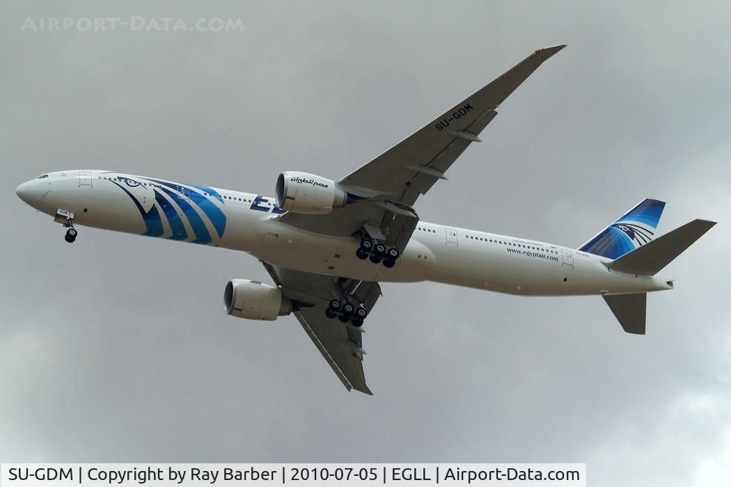 SU-GDM, 2010 Boeing 777-36N/ER C/N 38285, Boeing 777-36NER [38285] (EgyptAir) Home~G 05/07/2010. On approach 27R.