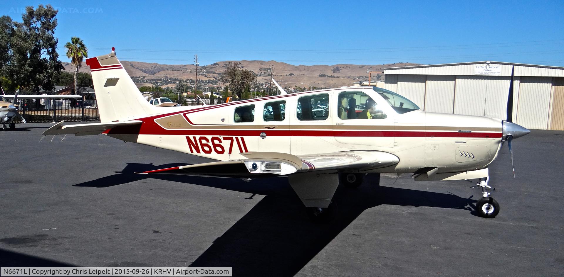 N6671L, 1983 Beech A36 Bonanza 36 C/N E-2079, Locally-based 1983 Beechcraft A36 Bonanza preparing for start up and departure at Reid Hillview Airport, San Jose, CA.
