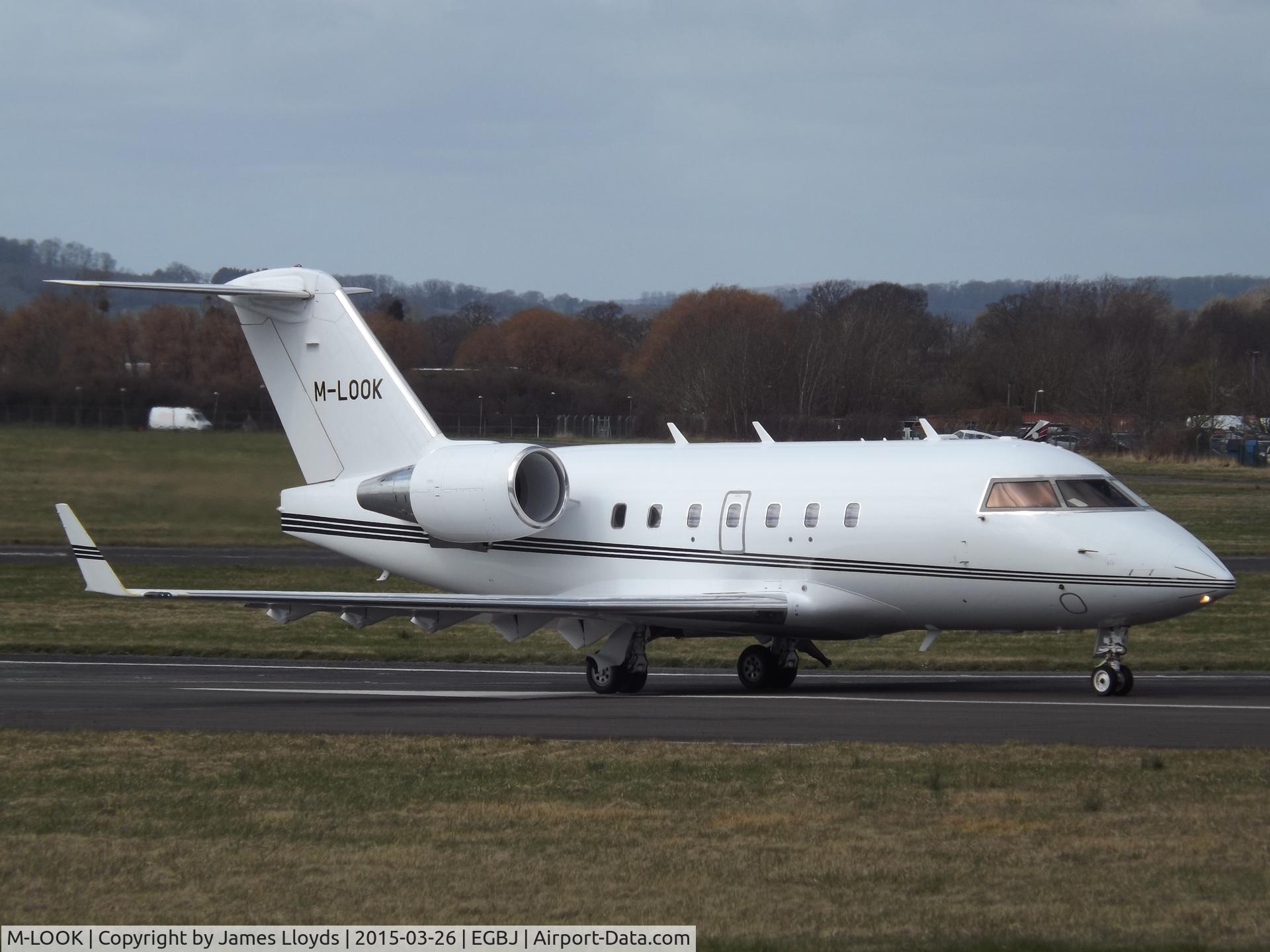 M-LOOK, 1996 Canadair Challenger 604 (CL-600-2B16) C/N 5319, M-LOOK Backtracking runway 27 at Gloucestershire Airport befor Takeing Off