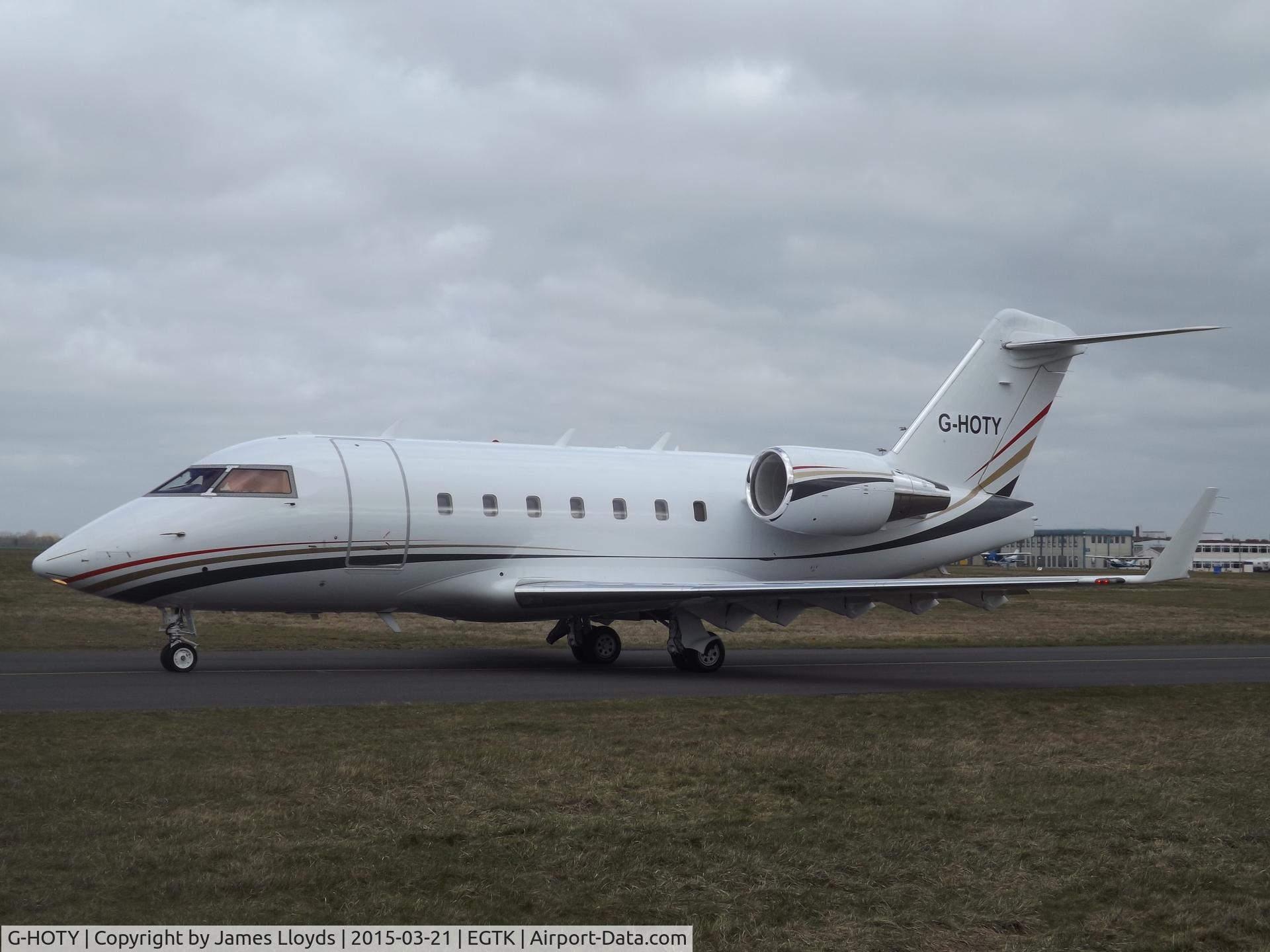 G-HOTY, 2000 Bombardier Challenger 604 (CL-600-2B16) C/N 5443, G-HOTY Taxing past me for dep on Runway 01 at Oxford.