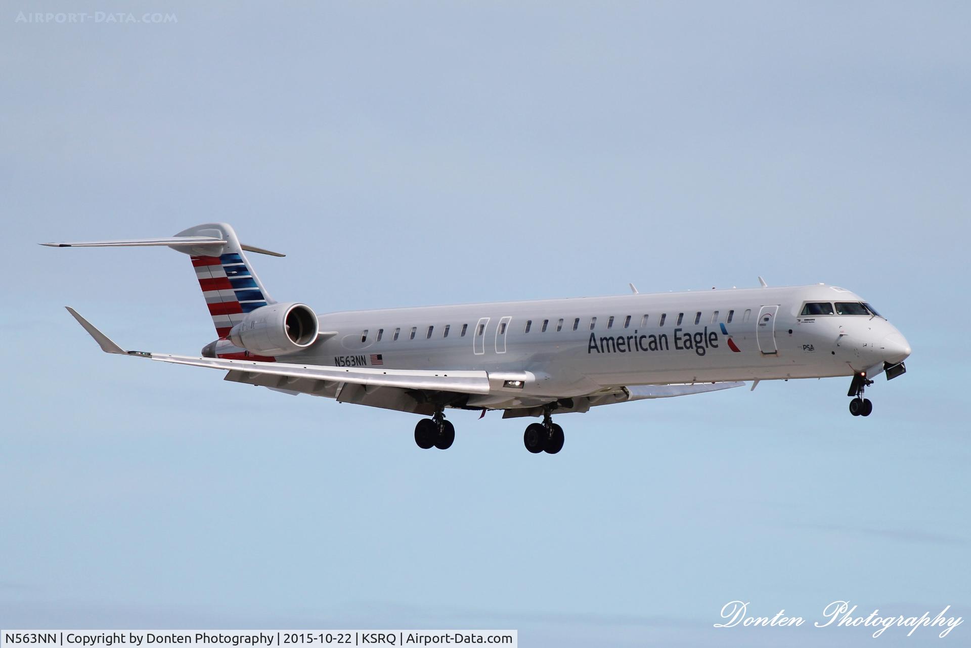 N563NN, 2015 Bombardier CRJ-900 (CL-600-2D24) C/N 15350, American Flight 5139 operated by PSA (N563NN) arrives at Sarasota-Bradenton International Airport following flight from Charlotte/Douglas International Airport