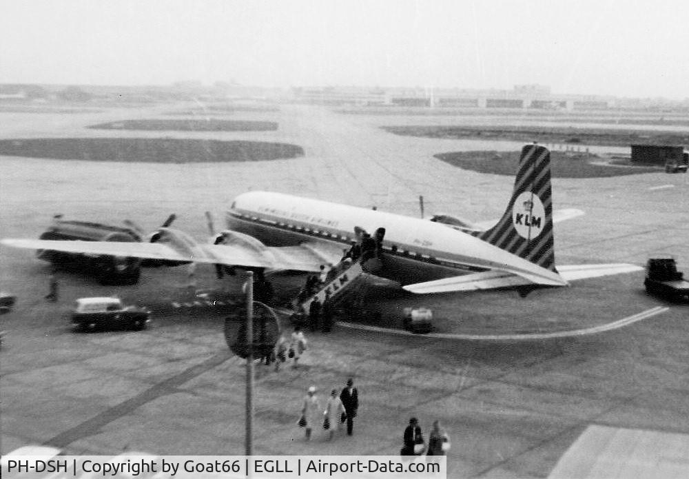 PH-DSH, 1957 Douglas DC-7C Seven Seas Seven Seas C/N 45187, Disembarking pax at LHR during May 1965.  Poor image, but it was the only camera I could afford.