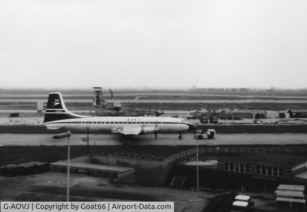 G-AOVJ, Bristol 175 Britannia 312 C/N 13418, Behind G-AOVJ the first ground is being broken for the foundations of what would become Terminal 3 at LHR.   May 1965