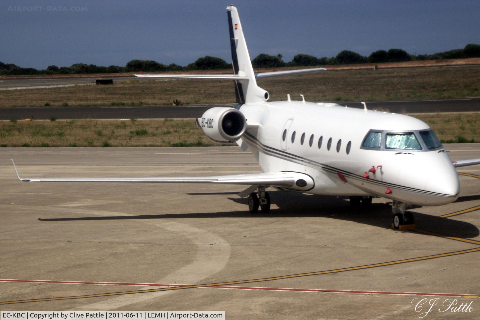 EC-KBC, 2006 Gulfstream Aerospace G200 C/N 145, Snapped from a passing aircraft on the ramp at Mahon, Menorca - LEMH