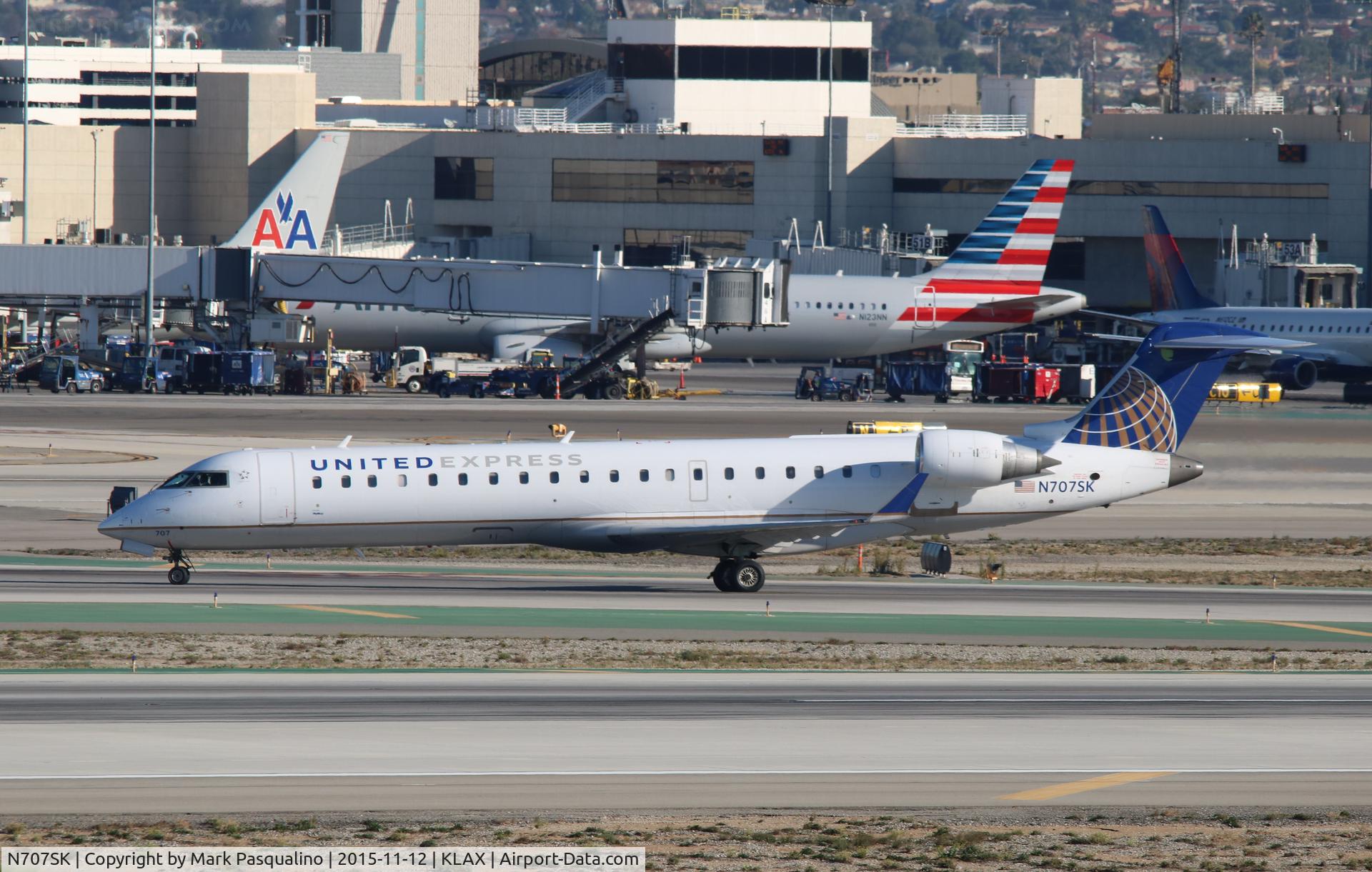 N707SK, 1999 Bombardier CRJ-701ER (CL-600-2C10) Regional Jet C/N 10003, CL-600-2C10