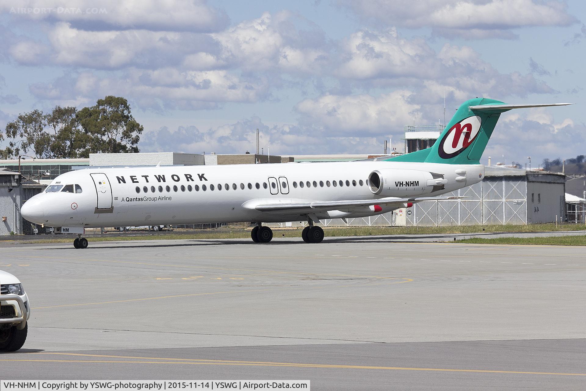 VH-NHM, 1993 Fokker 100 (F-28-0100) C/N 11449, Network Aviation (VH-NHM) Fokker 100 taxiing at Wagga Wagga Airport.
