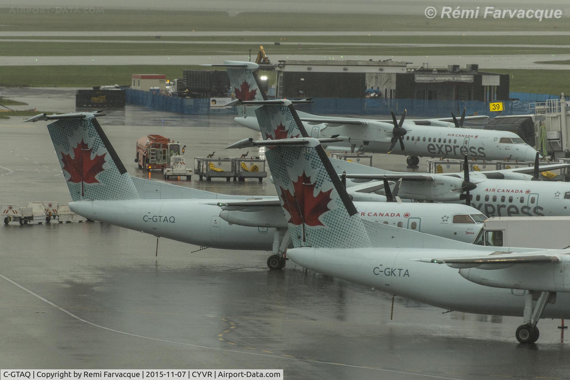 C-GTAQ, 1989 De Havilland Canada DHC-8-301 Dash 8 C/N 180, Parked in C wing