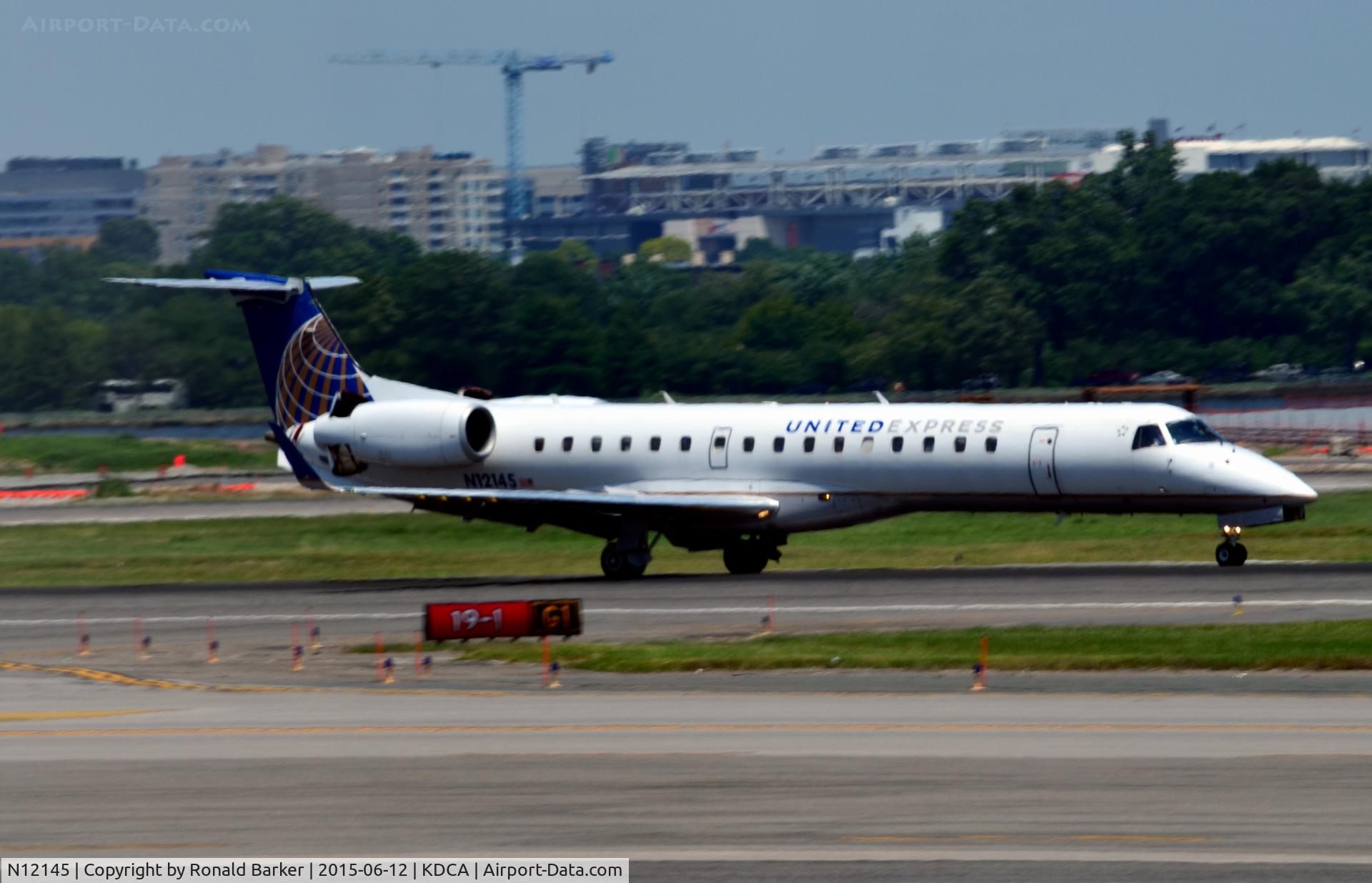 N12145, 2003 Embraer ERJ-145XR (EMB-145XR) C/N 145745, Landing National