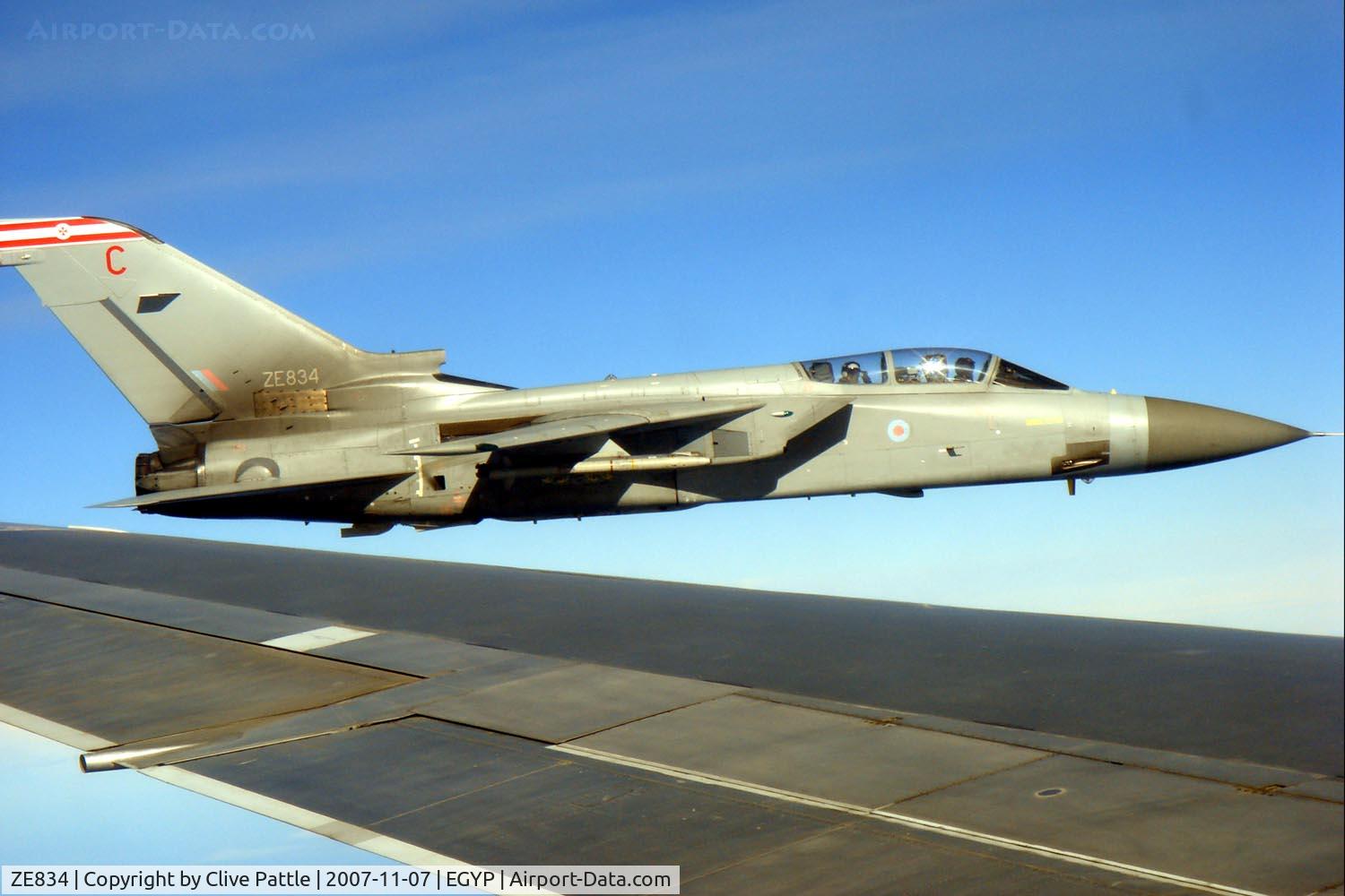 ZE834, 1988 Panavia Tornado F.3 C/N 725/AS078/3331, Escorting aircraft to RAF Mount Pleasant EGYP whilst coded 'C' with 1435 Flt RAF. Note Nav taking a return photo.