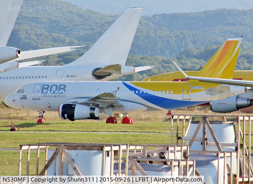 N530MF, 2002 Airbus A319-132 C/N 1703, Parked... still in full BQB Lineas Aereas...