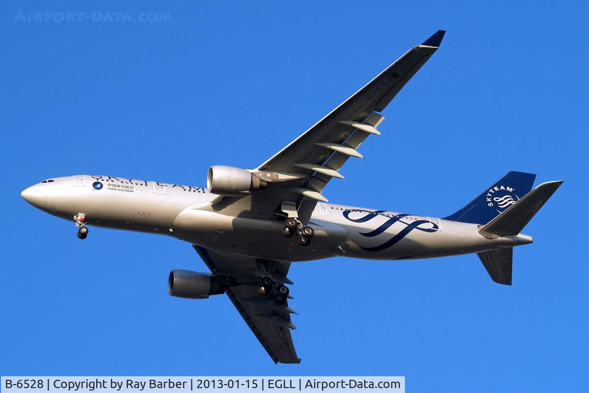 B-6528, 2010 Airbus A330-223 C/N 1202, Airbus A330-223 [1202] (China Southern Airlines) Home~G 15/01/2013. On approach 27R. Skyteam colours.