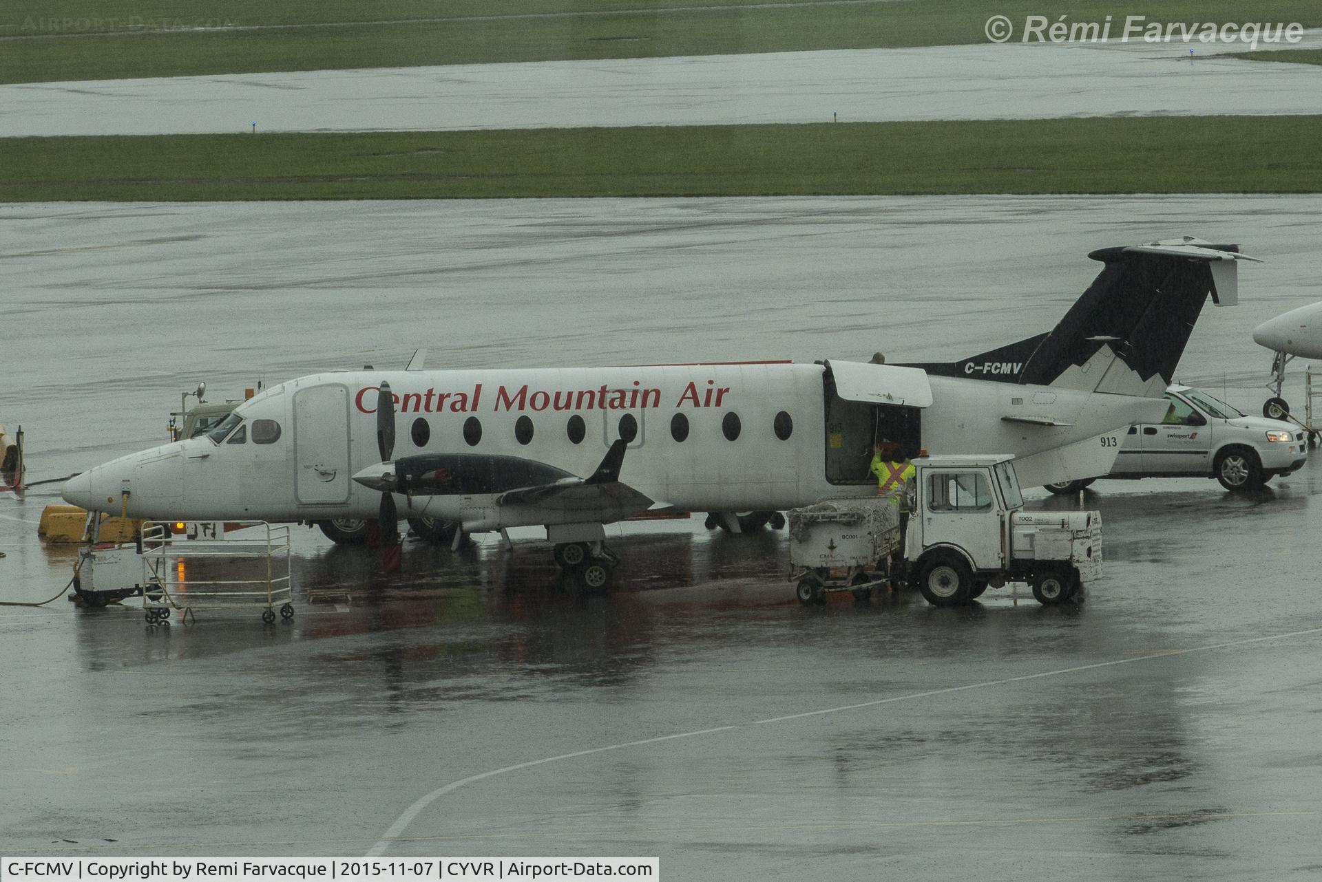 C-FCMV, 1997 Beech 1900D C/N UE-272, Rear cargo door open, loading.