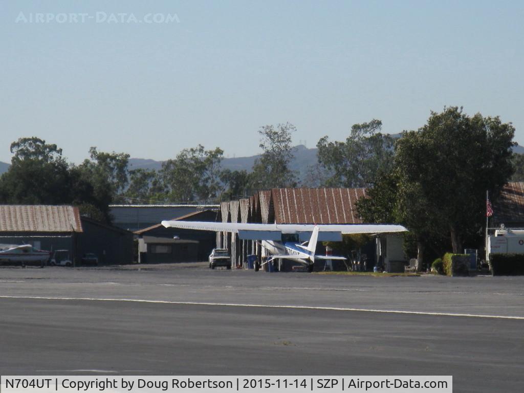 N704UT, 1976 Cessna 150M C/N 15078891, 1976 Cessna 150M, Continental O-200 100 Hp, finally near touchdown landing on Rwy 22 in gusty crosswind