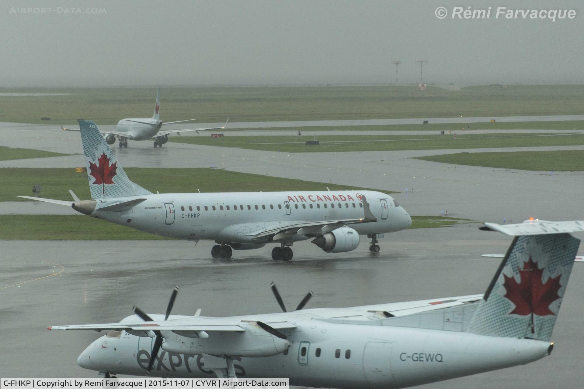 C-FHKP, 2006 Embraer 190AR (ERJ-190-100IGW) C/N 19000055, In middle. Taxiing for take-off