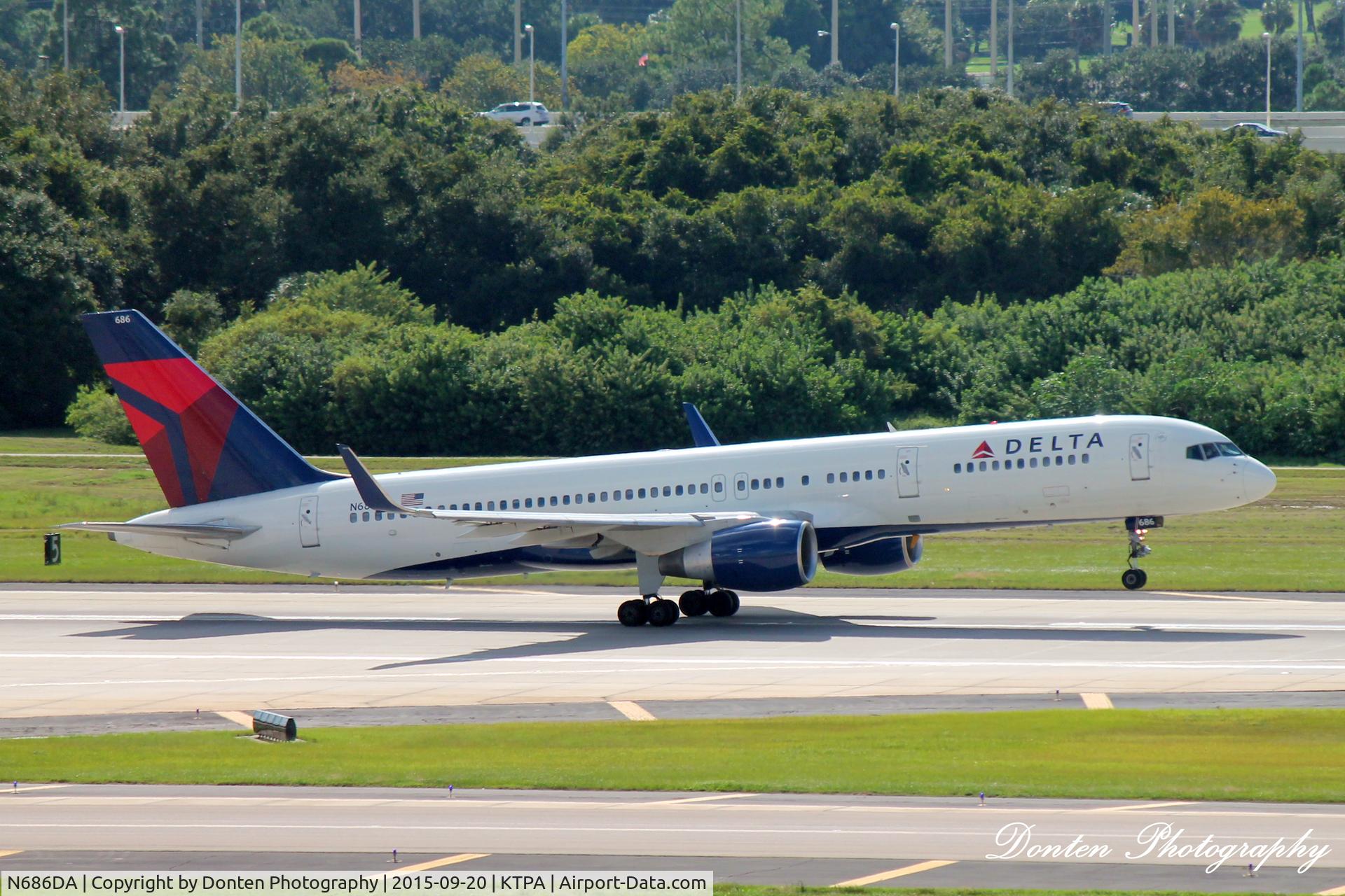 N686DA, 1995 Boeing 757-232 C/N 27589, Delta Flight 2023 (N686DA) departs Tampa International Airport enroute to Hartsfield-Jackson Atlanta International Airport