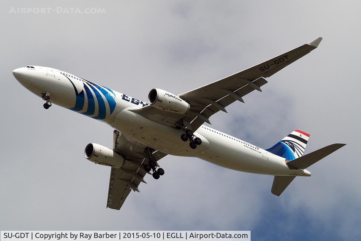 SU-GDT, 2011 Airbus A330-343X C/N 1230, Airbus A330-343E [1230] (EgyptAir) Home~G 10/05/2015. On approach 27R. National flag now applied to the top of the tail