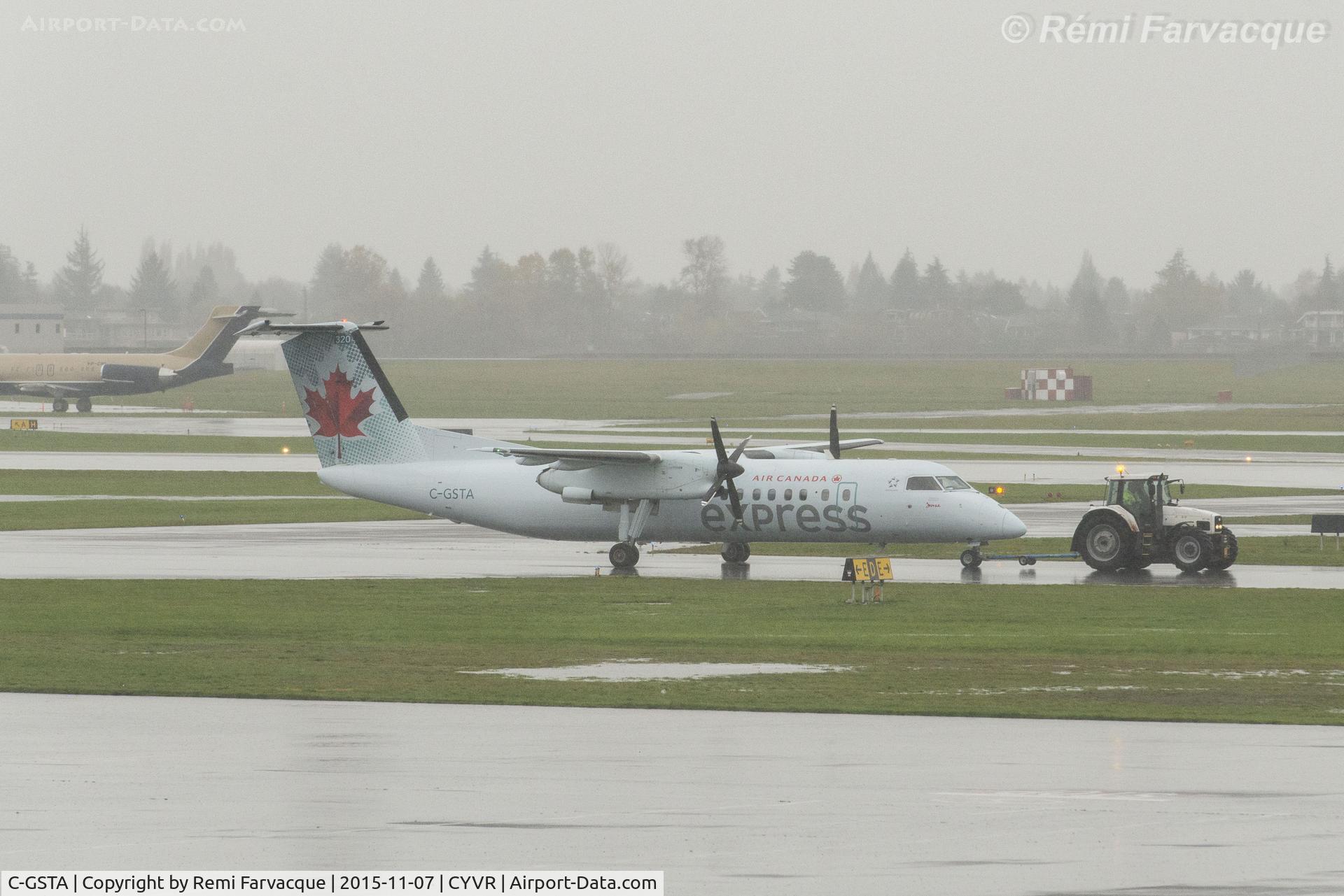 C-GSTA, 1989 De Havilland Canada DHC-8-301 Dash 8 C/N 182, Getting towed from hangar to terminal