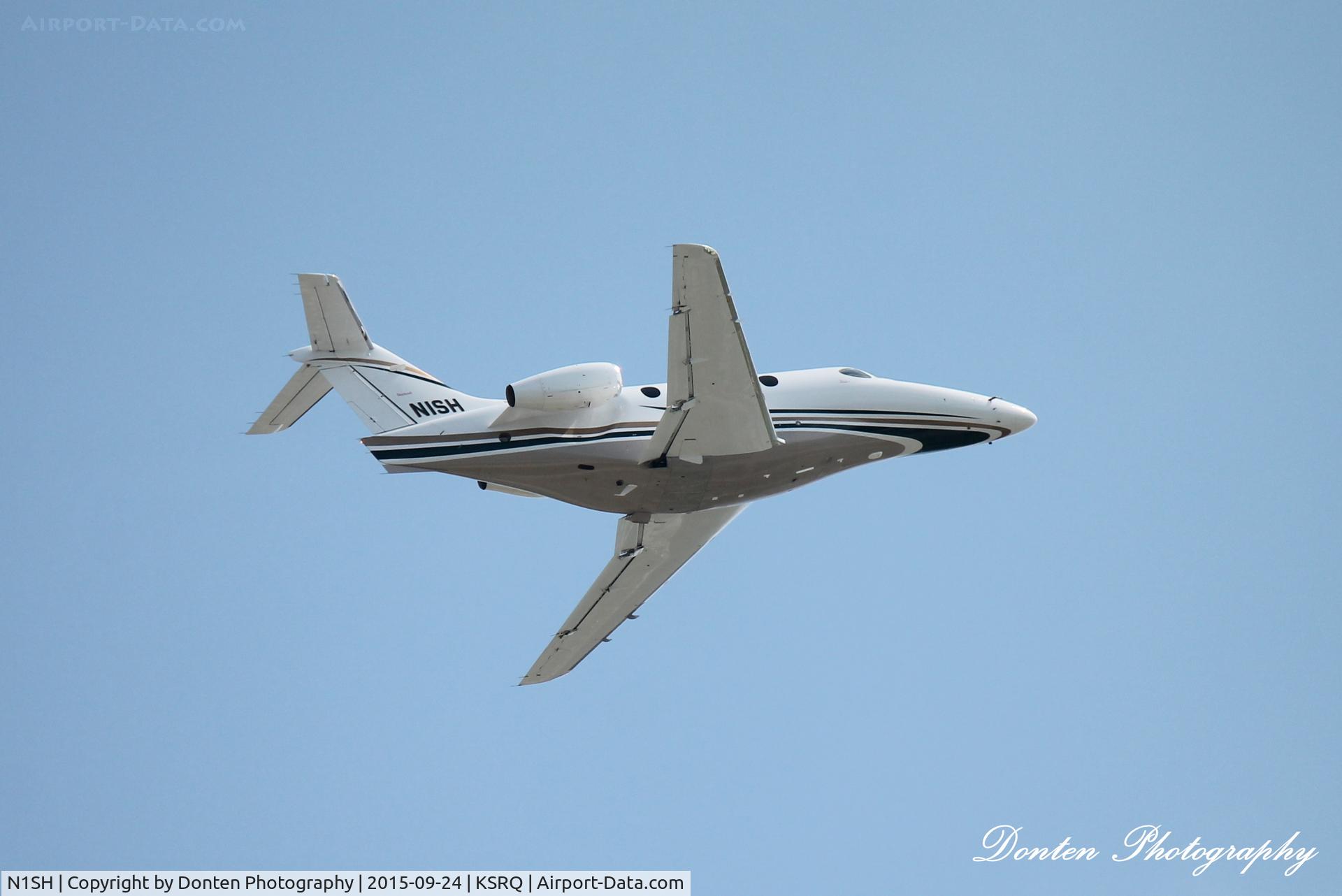N1SH, 2004 Raytheon 390 Premier 1 C/N RB-117, Raytheon Premier (N1SH) departs Sarasota-Bradenton International Airport enroute to Chicago-O'Hare International Airport