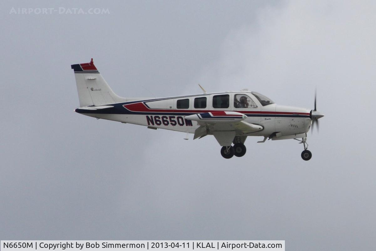 N6650M, 1979 Beech A36 Bonanza 36 C/N E-1518, Arriving at Lakeland, FL - Sun N Fun 2013