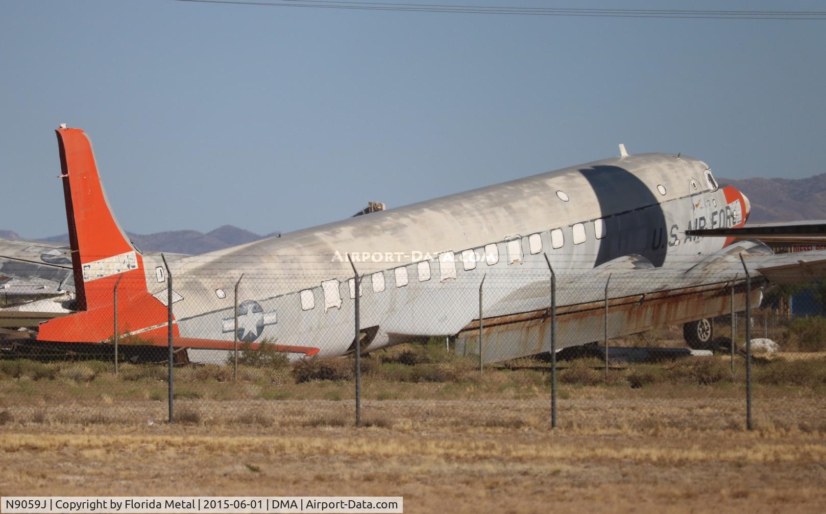 N9059J, Douglas EC-118A Liftmaster (DC-6A) C/N 44616, C-118A in a private scrapyard near Davis Monthan