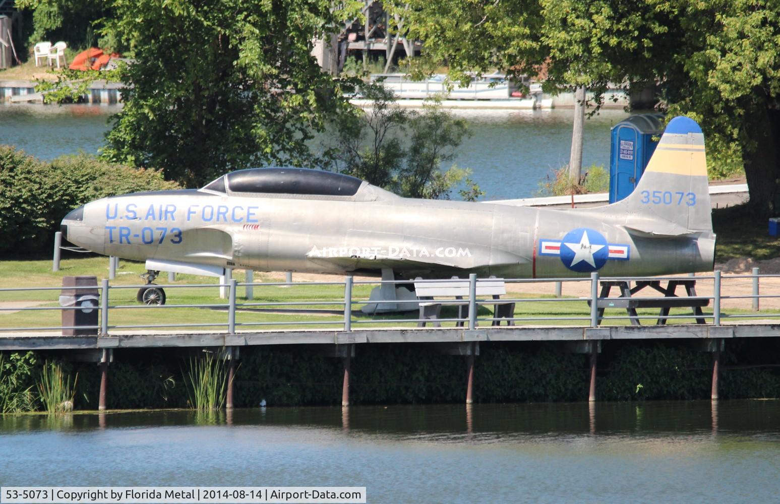 53-5073, 1953 Lockheed T-33A Shooting Star C/N 580-8423, T-33A Shooting Star in a park in Hart MI - the day I went through the road was closed at the park so I had to shoot it from across the lake with my 500mm