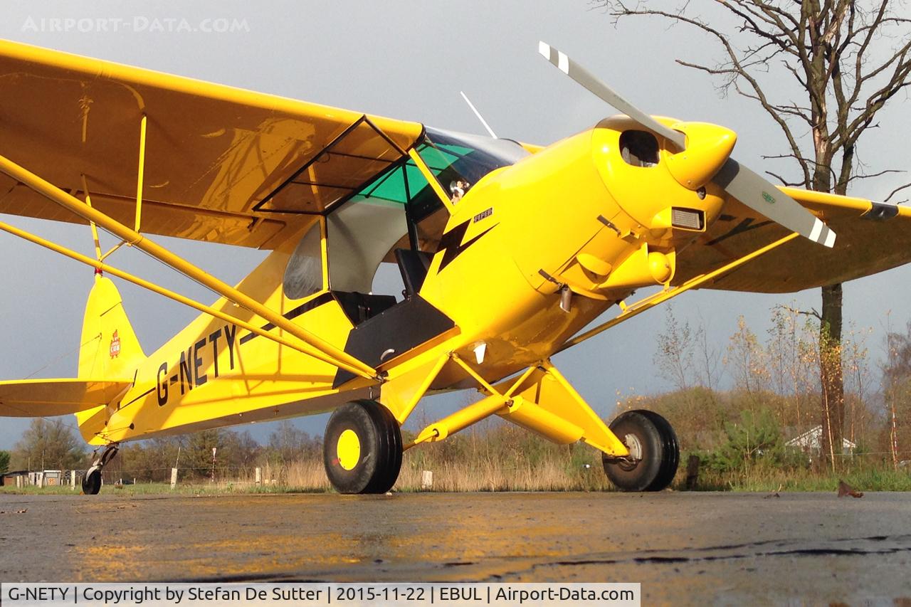 G-NETY, 1994 Piper PA-18-150 Super Cub C/N 1809108, In between two rainshowers.