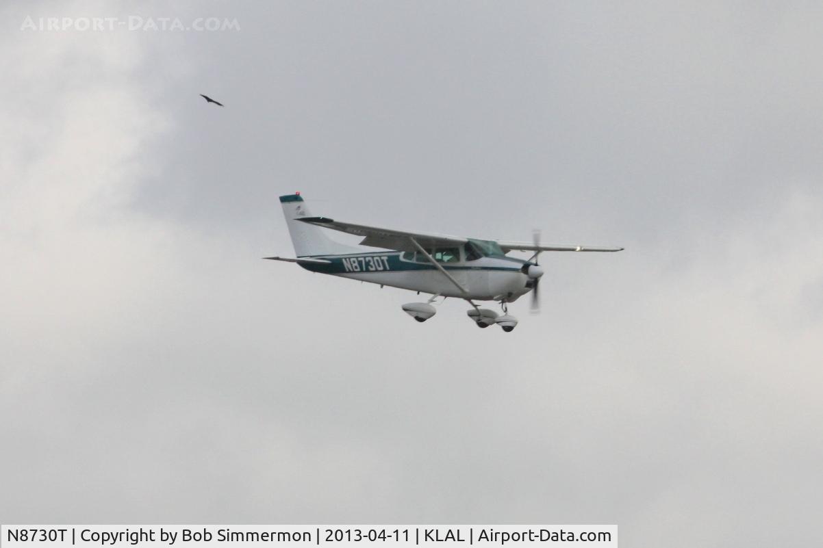 N8730T, 1960 Cessna 182C Skylane C/N 52630, Arriving at Lakeland, FL - Sun N Fun 2013.