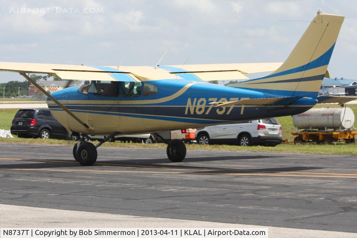 N8737T, 1960 Cessna 182C Skylane C/N 52637, Departing Lakeland, FL - Sun N Fun 2013.